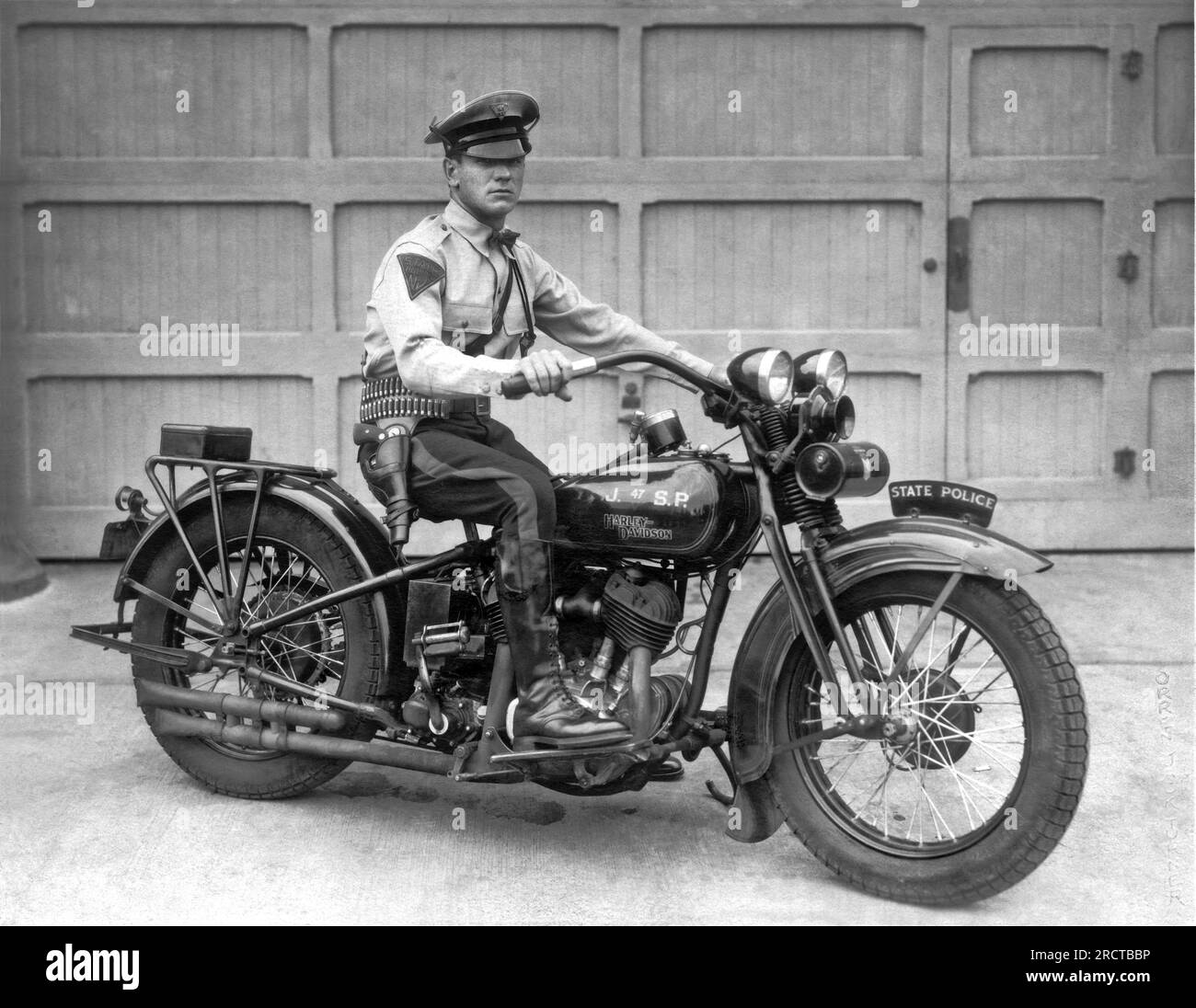 New Jersey:  1930. Trooper Haley of the New Jersey State Police poses on his Harley Davidson motorcycle. Stock Photo