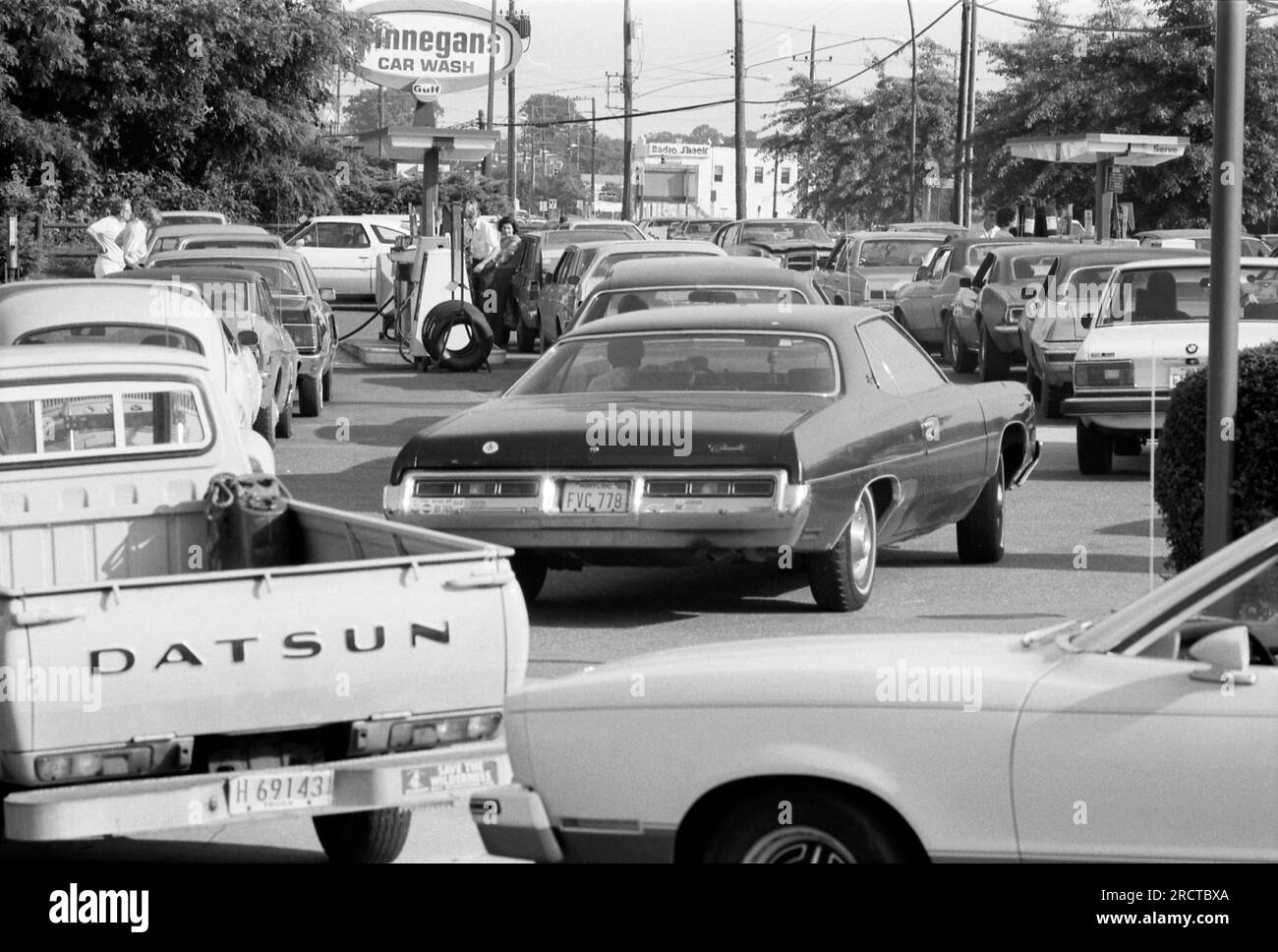 Maryland:  June, 1979  Long lines of cars waiting for fuel at a gas station. Stock Photo