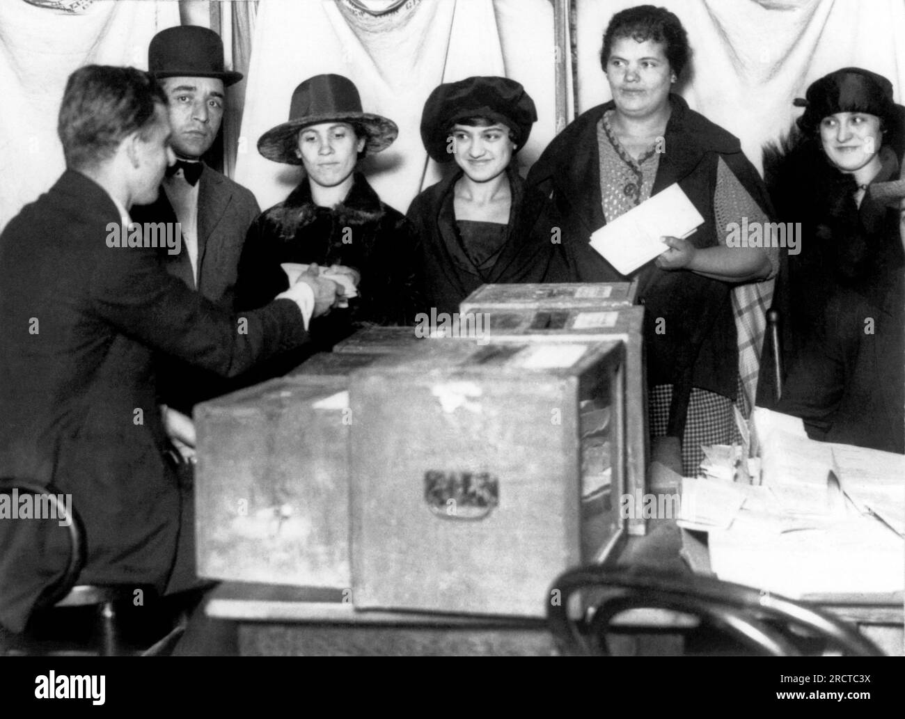 New York, New York:  1920 Women line up to vote for the first time in New York after the passage of the 19th Amendment. Stock Photo