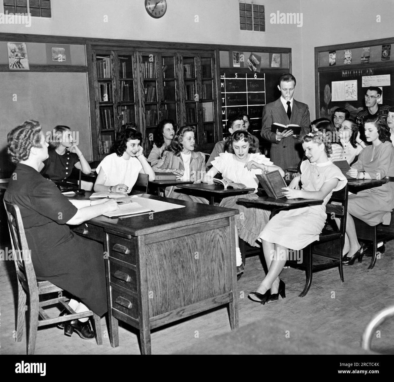 Massachusetts:  June 4, 1947 Well dressed teenagers in the high school classroom. Stock Photo