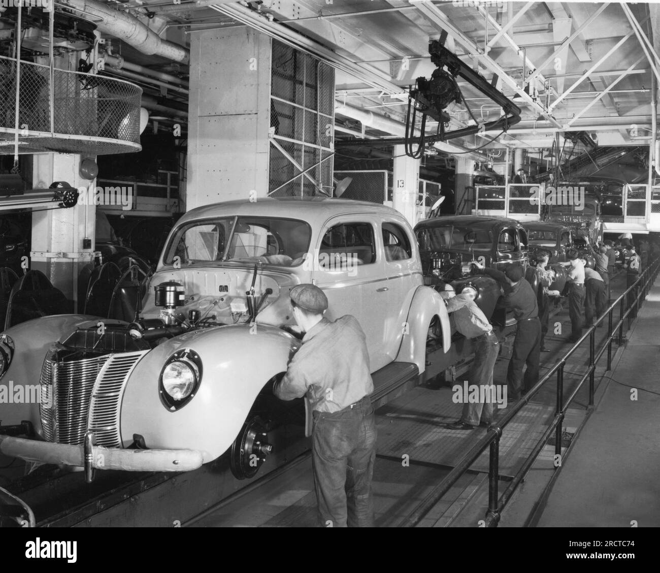 Detroit, Michigan: 1940 The assembly line for the 1940 Ford two door