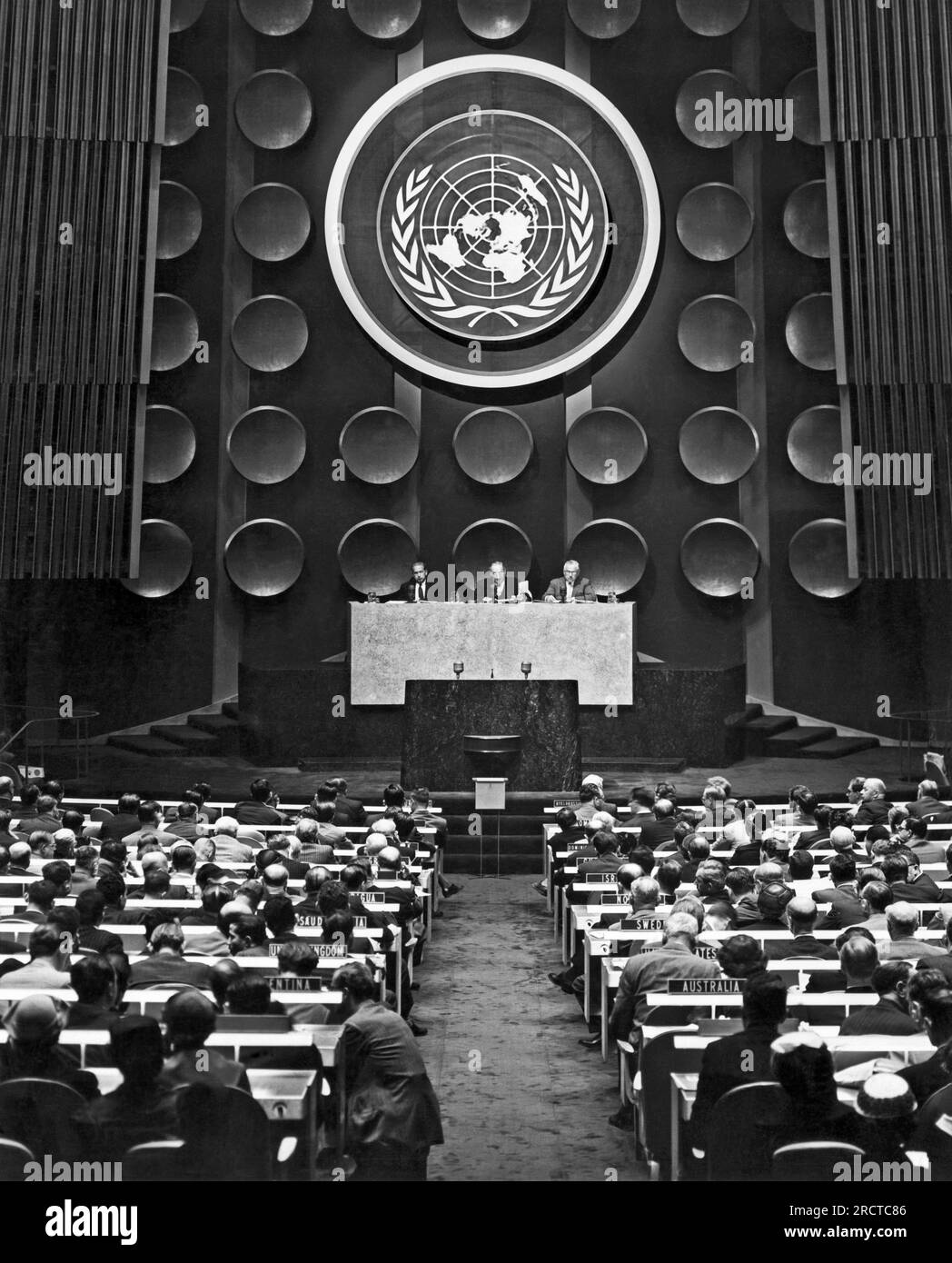 New York, New York:  September 20, 1955 Opening meeting of the 10th regular session of the United Nations General Assembly with Secretary-General Dag Hammarskjold on the rostrum at the far left. Stock Photo