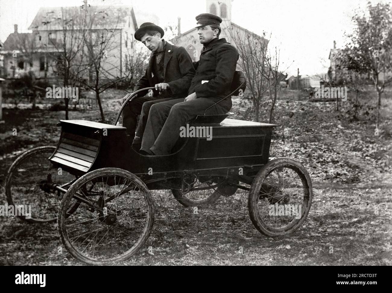United States c. 1903 John and Arthur Hull in the first car made by