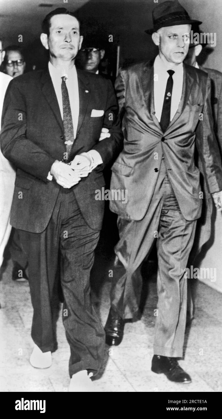 Jackson, Mississippi  June 23, 1963 White supremacist and Klansman Byron de La Beckworth is escorted by FBI agents into the Jackson police station for arraignment on federal charges in the ambush murder of integration leader Medgar Evers. Stock Photo