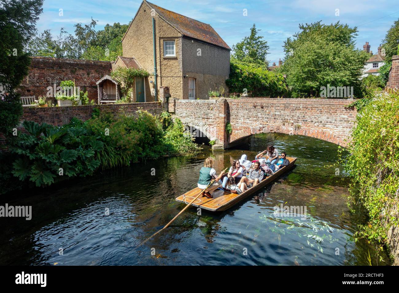River Stour,Flowing,Through,the,Franciscan Gardens,River Trip,Punt,visitors,guided tour,Canterbury,Kent,England Stock Photo