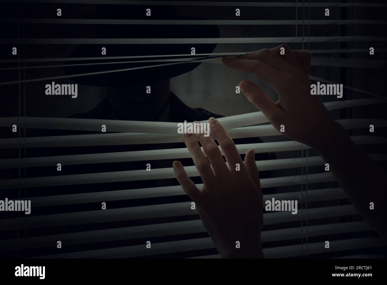 Stranger Outside Window Plastic rain hat hi-res stock photography and images - Alamy