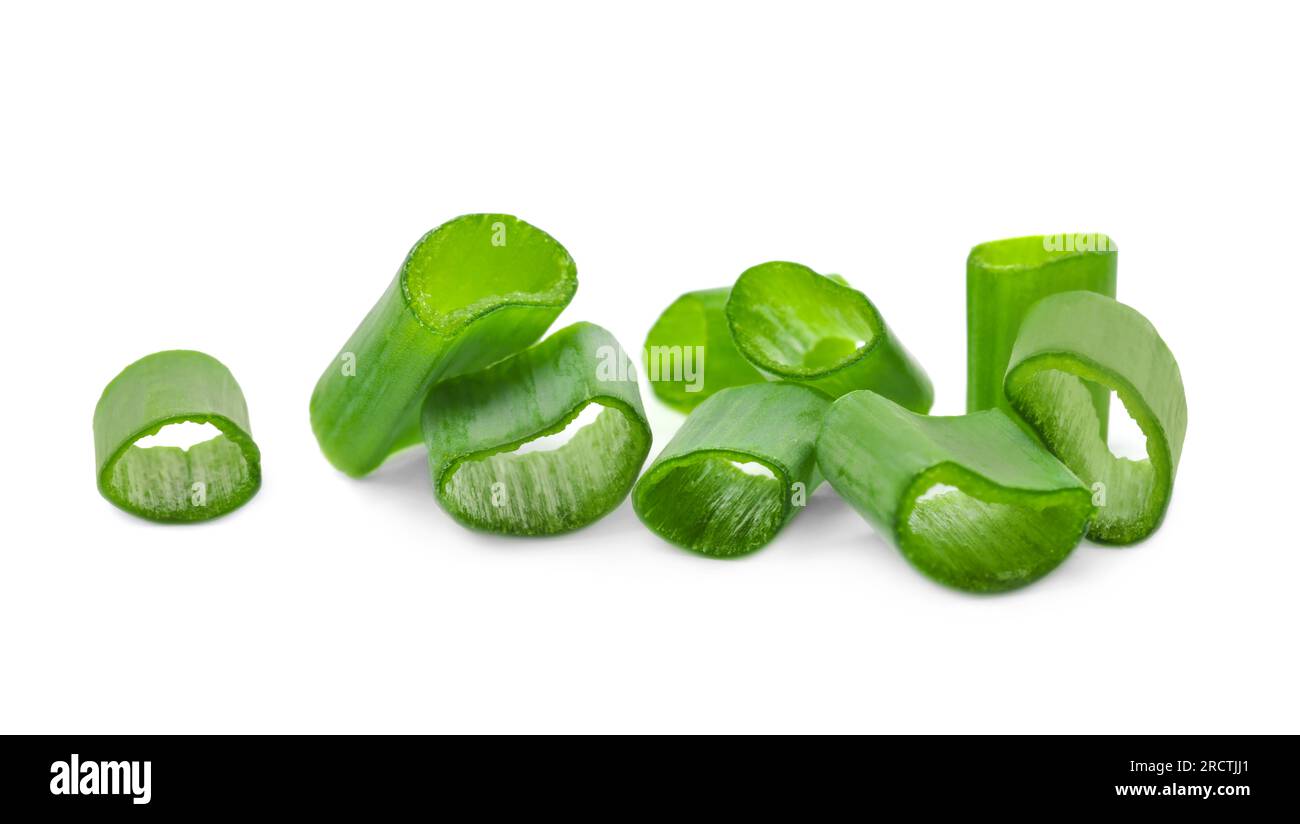 Chopped fresh green onions on white background Stock Photo - Alamy