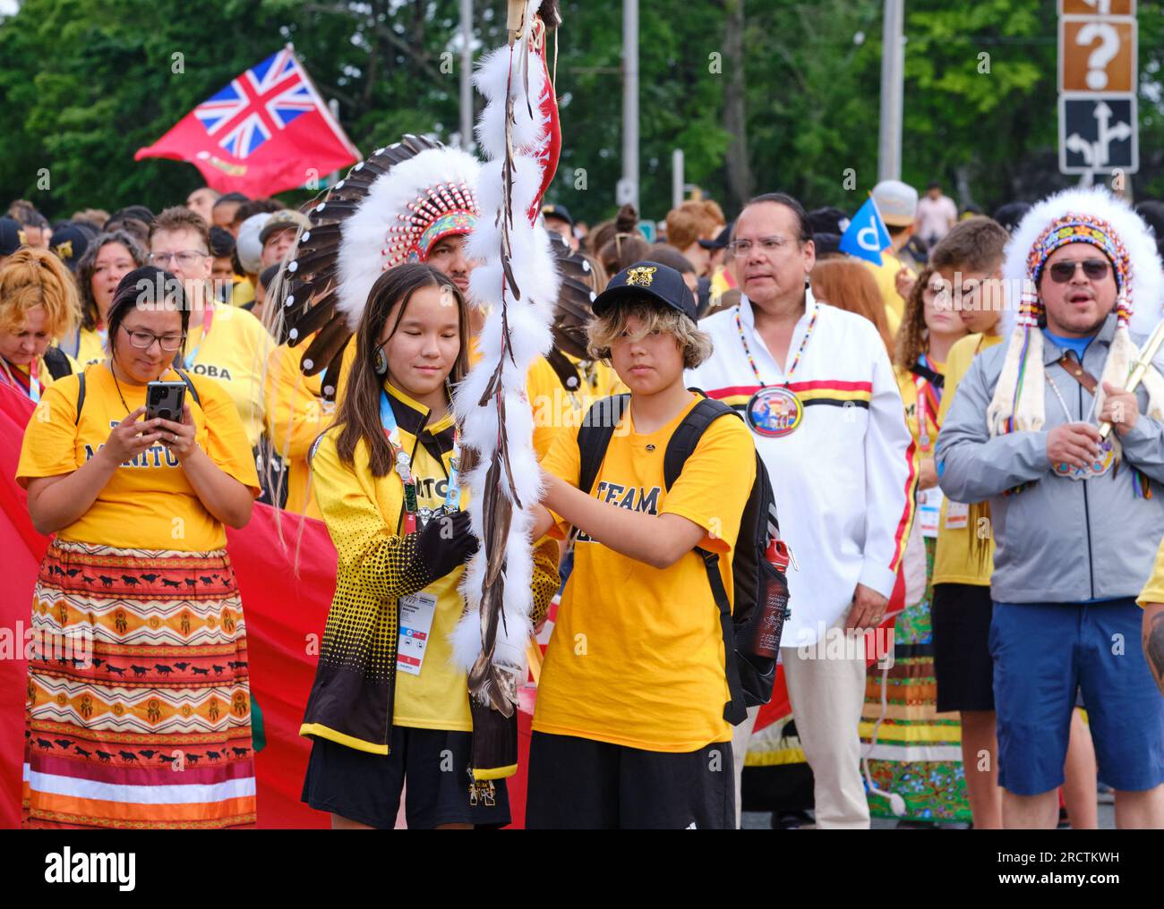 Halifax, Nova Scotia, Canada. July 16th, 2023. The Manitoba delegation at The athletes Parade of the opening ceremony of the 10th North American Indigenous Games (NAIG) on the streets of Kjipuktuk (Halifax). Over 5000 athletes from 756 Indigenous Nations across Turtle Island will be competing until July 23rd with competitions in 16 sports within 21 venues across the area. Credit: meanderingemu/Alamy Live News Stock Photo