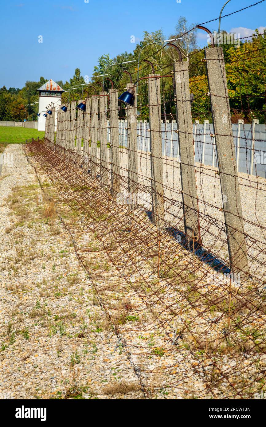 Perimeter fence with electrified barbed wire at Dachau Concentration Camp in Germany Stock Photo