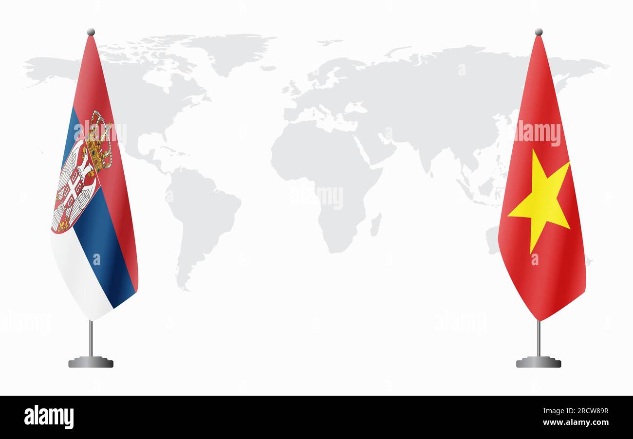 Serbia and Vietnam flags for official meeting against background of