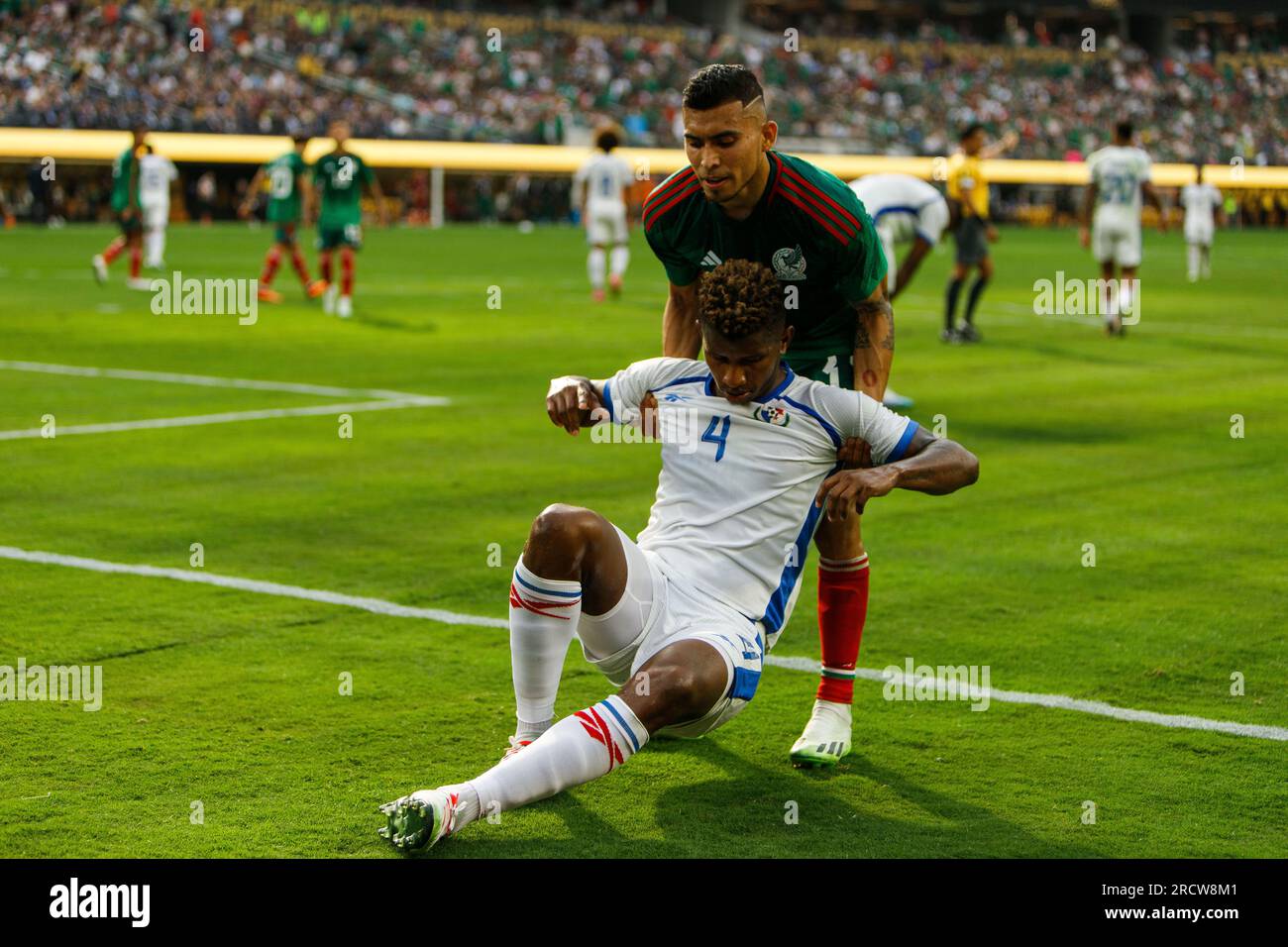Los Angeles, California, USA. 16th July, 2023. ORBELIN PINEDA of the Mexican National Football Team helps up FIDEL ESCOBAR of the Panamanian National Football Team during the CONCACAF Gold Cup final at Sofi Stadium in Los Angeles, California on July 16th, 2023. (Credit Image: © Alex Cave/ZUMA Press Wire) EDITORIAL USAGE ONLY! Not for Commercial USAGE! Credit: ZUMA Press, Inc./Alamy Live News Stock Photo