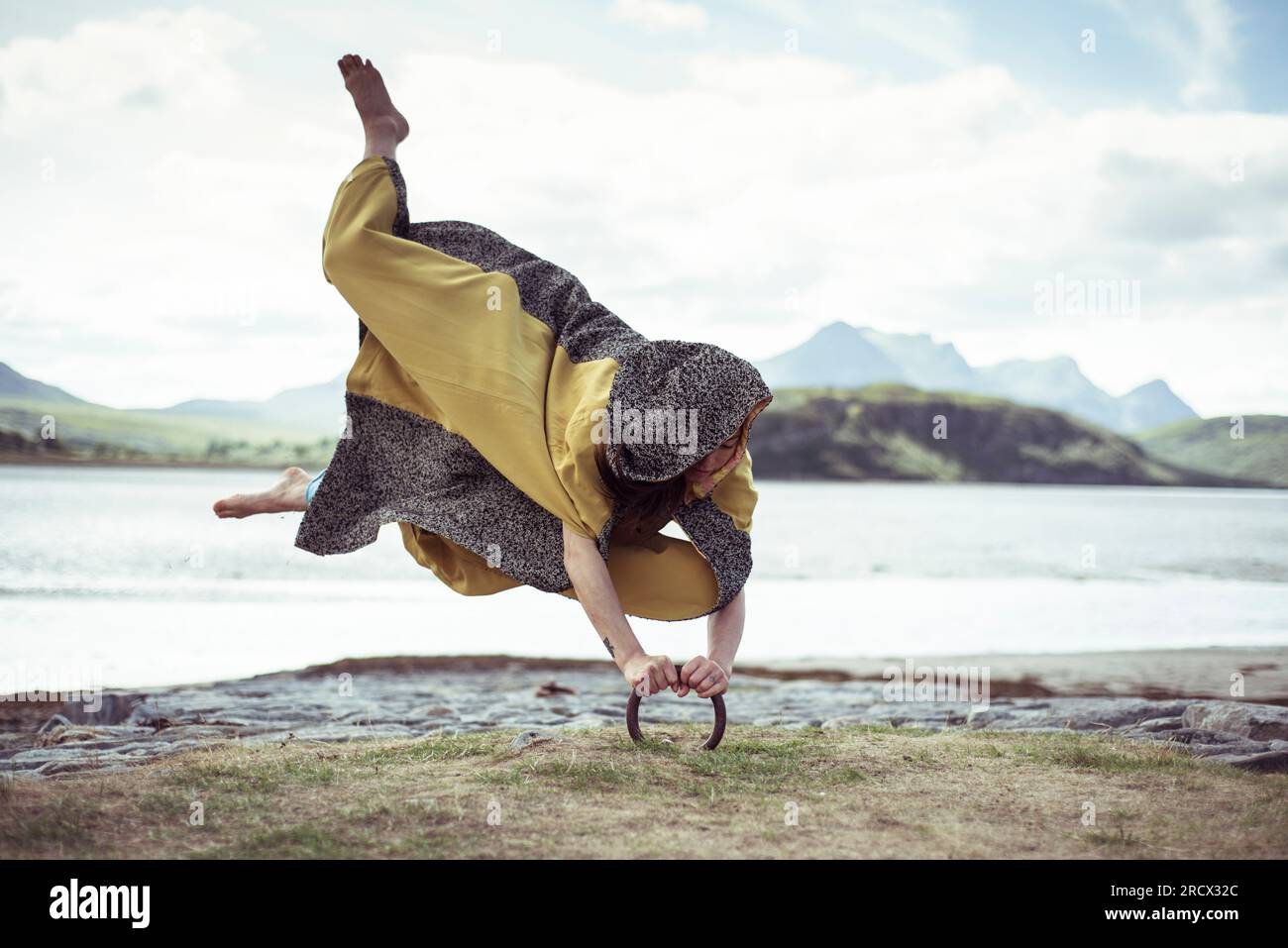 dancer appears to levitate grips to ground Stock Photo Alamy