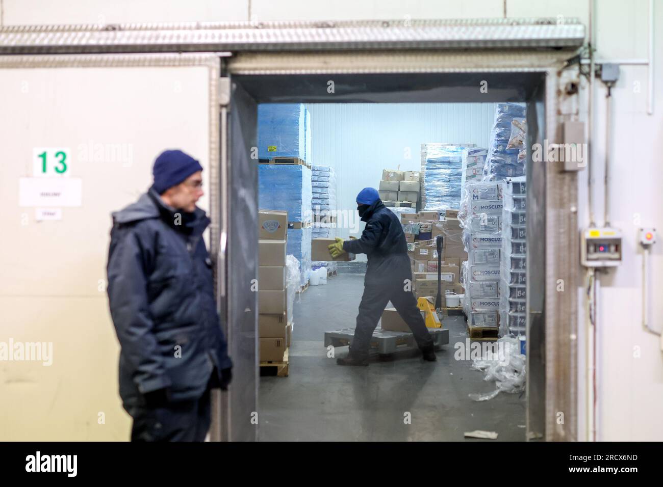 In the warm summer months, workers in cold stores change the external