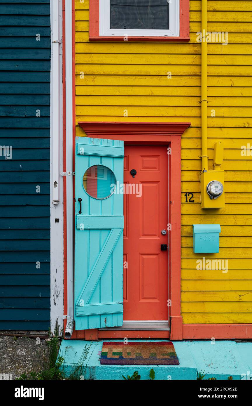 Brightly painted house with colorful door in St. John's, Newfoundland
