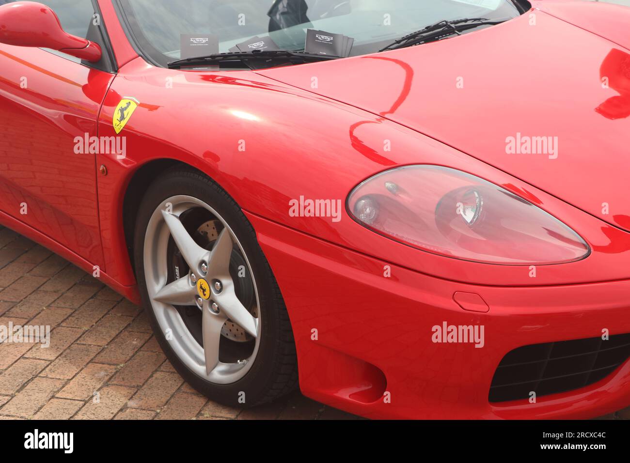 front of red Ferrari 360 sports car in Lelystad, the Netherlands, June 18 2023 Stock Photo