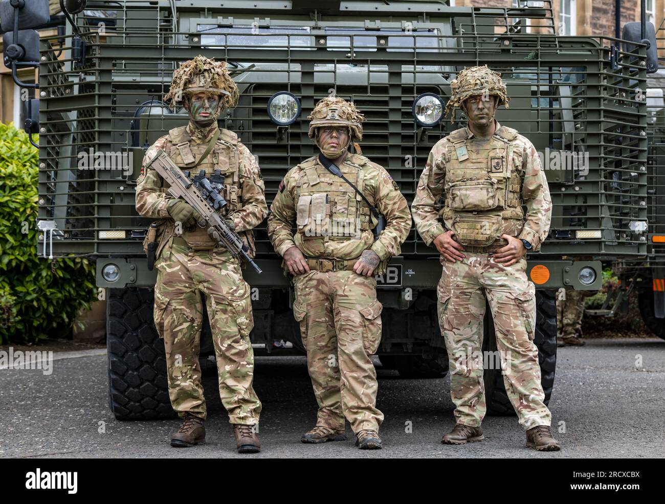 Redford Barracks, Edinburgh, Scotland, UK, 17 July 2023. Soldiers of 3rd battalion rifles with a huge heavily armoured Mastiff vehicle designed to counter threats from roadside bombs Stock Photo
