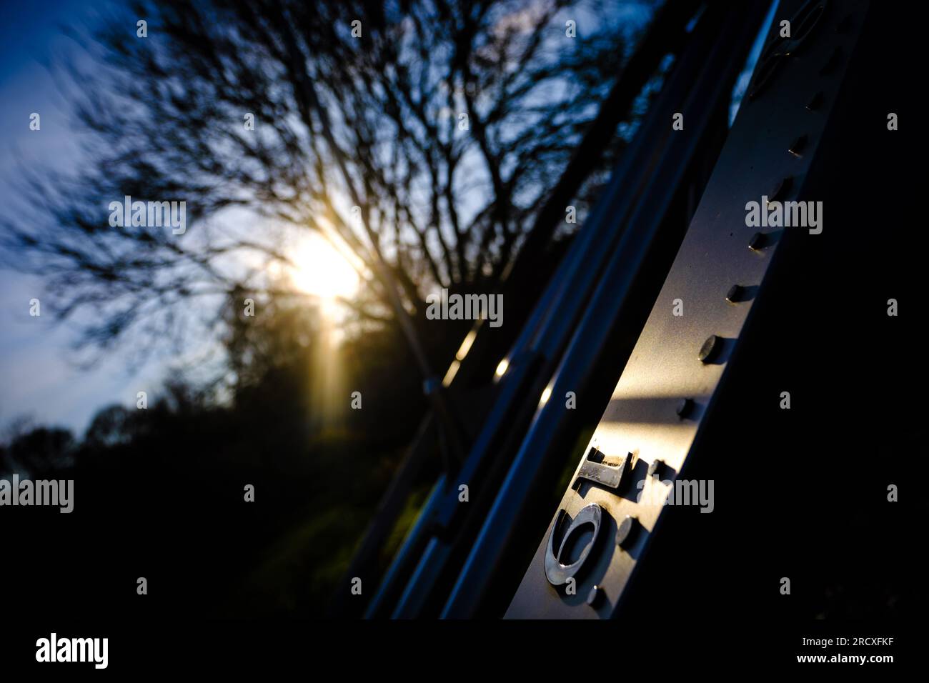 Sundial and low sun detail photographed at Herstmonceux Castle in East