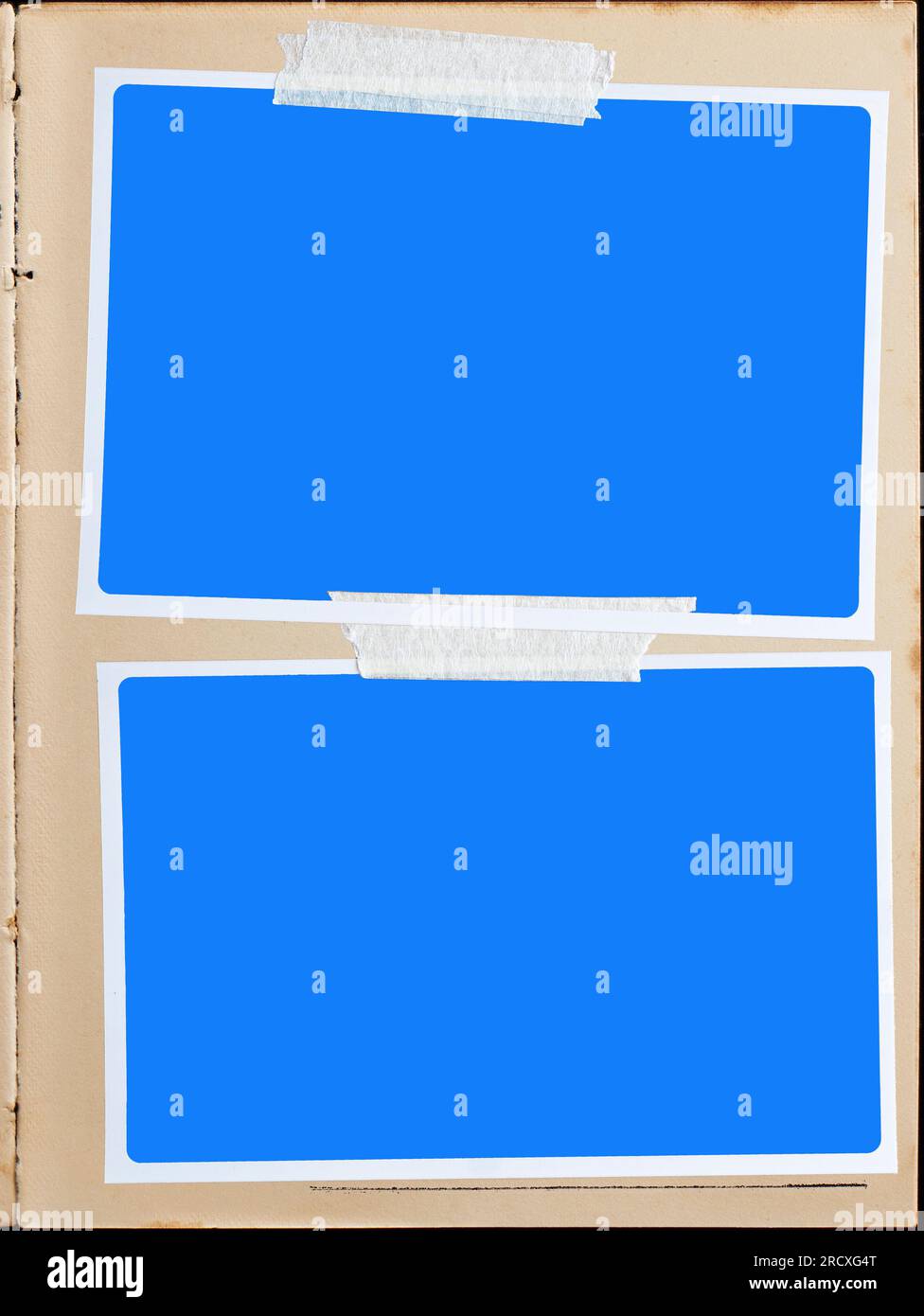 A vintage book page with two blank photo frames attached with adhesive tape Stock Photo Alamy