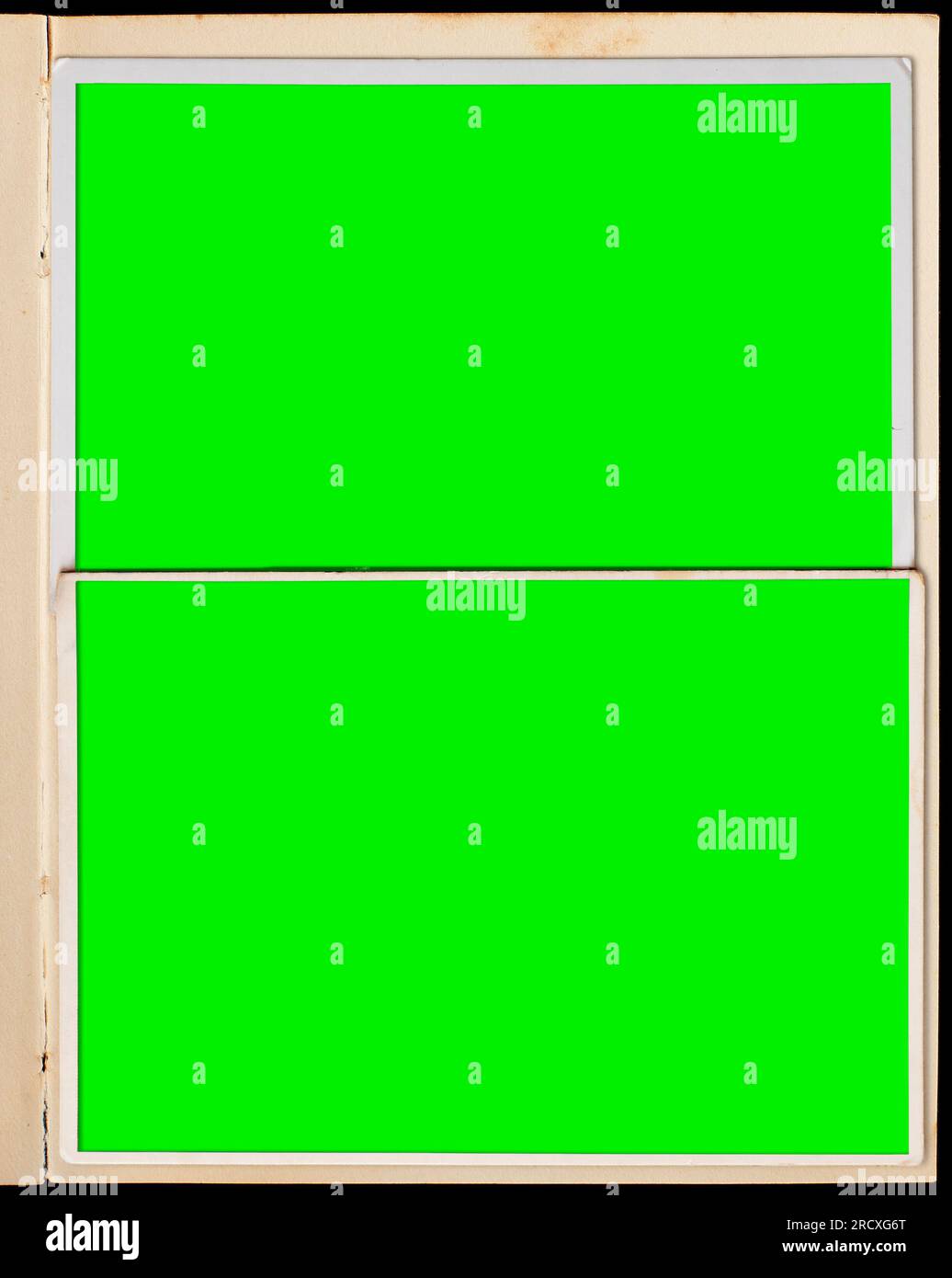 A vintage book page with two blank photo frames. Stock Photo