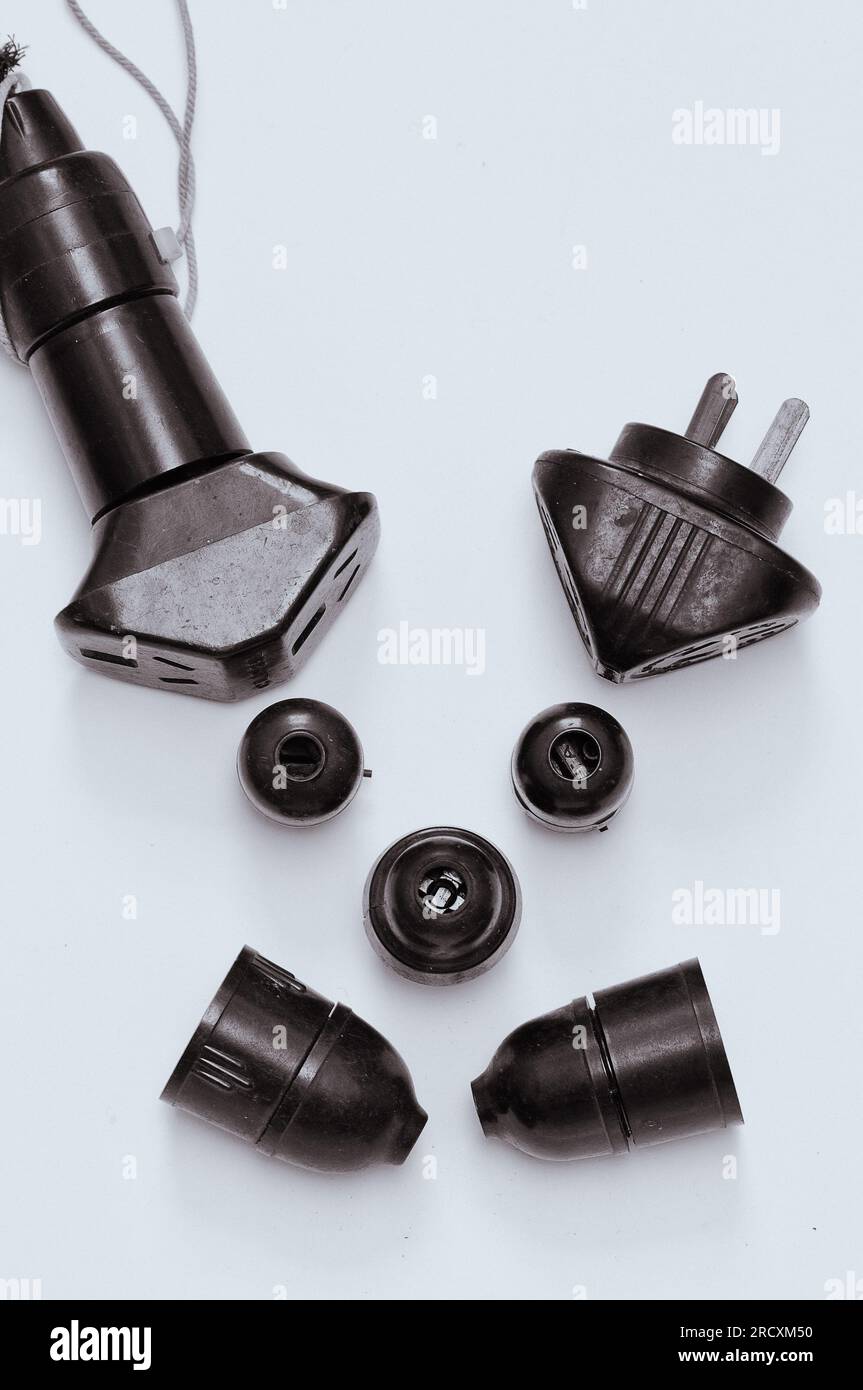 A collection of dark brown art Deco Bakelite (plastic) household