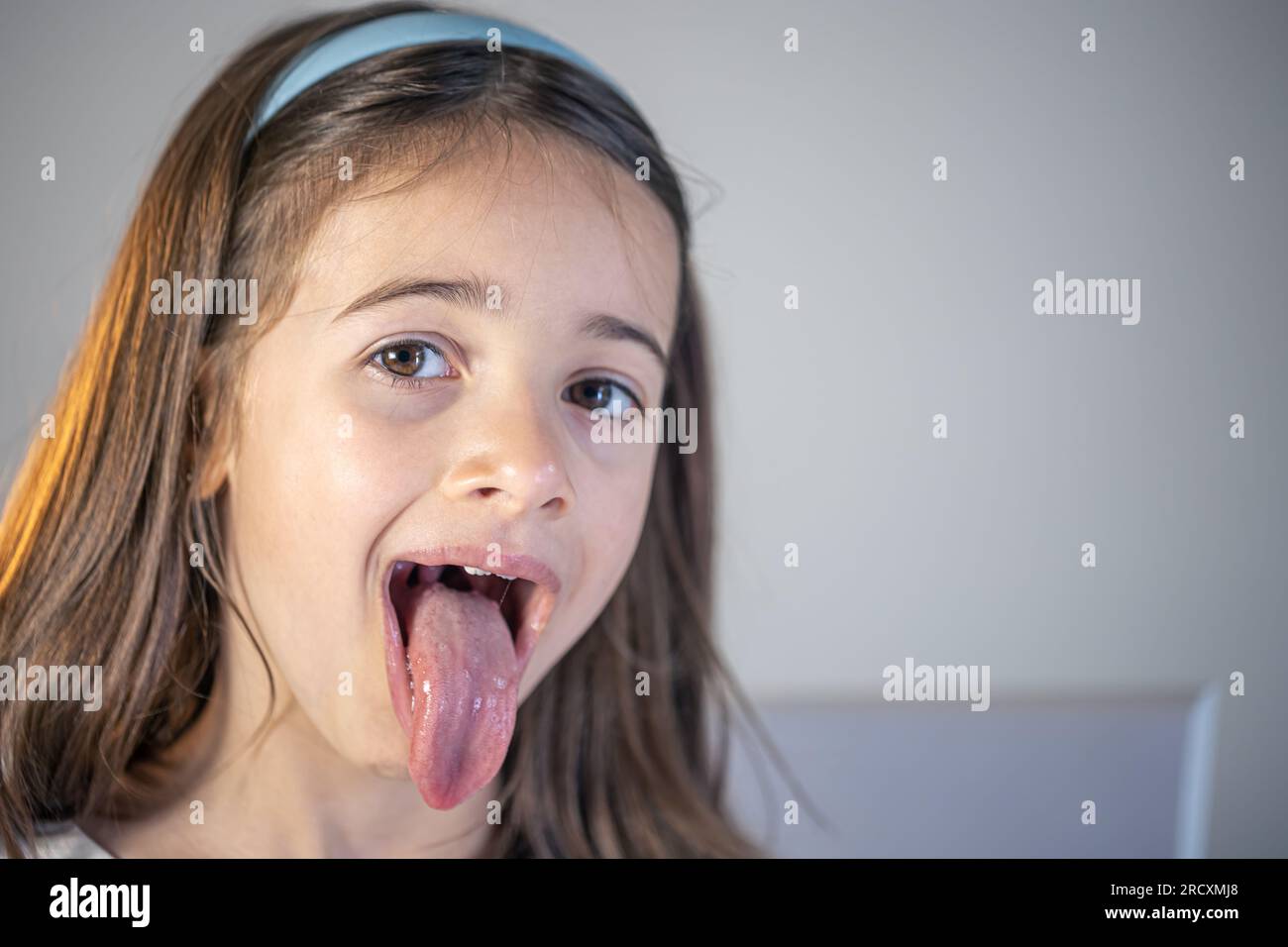 A Child Girl Open Her Mouth And Show Her Tounge Stock Photo Alamy A Child Girl Open Her Mouth And Show Her Tounge Stock Photo Alamy