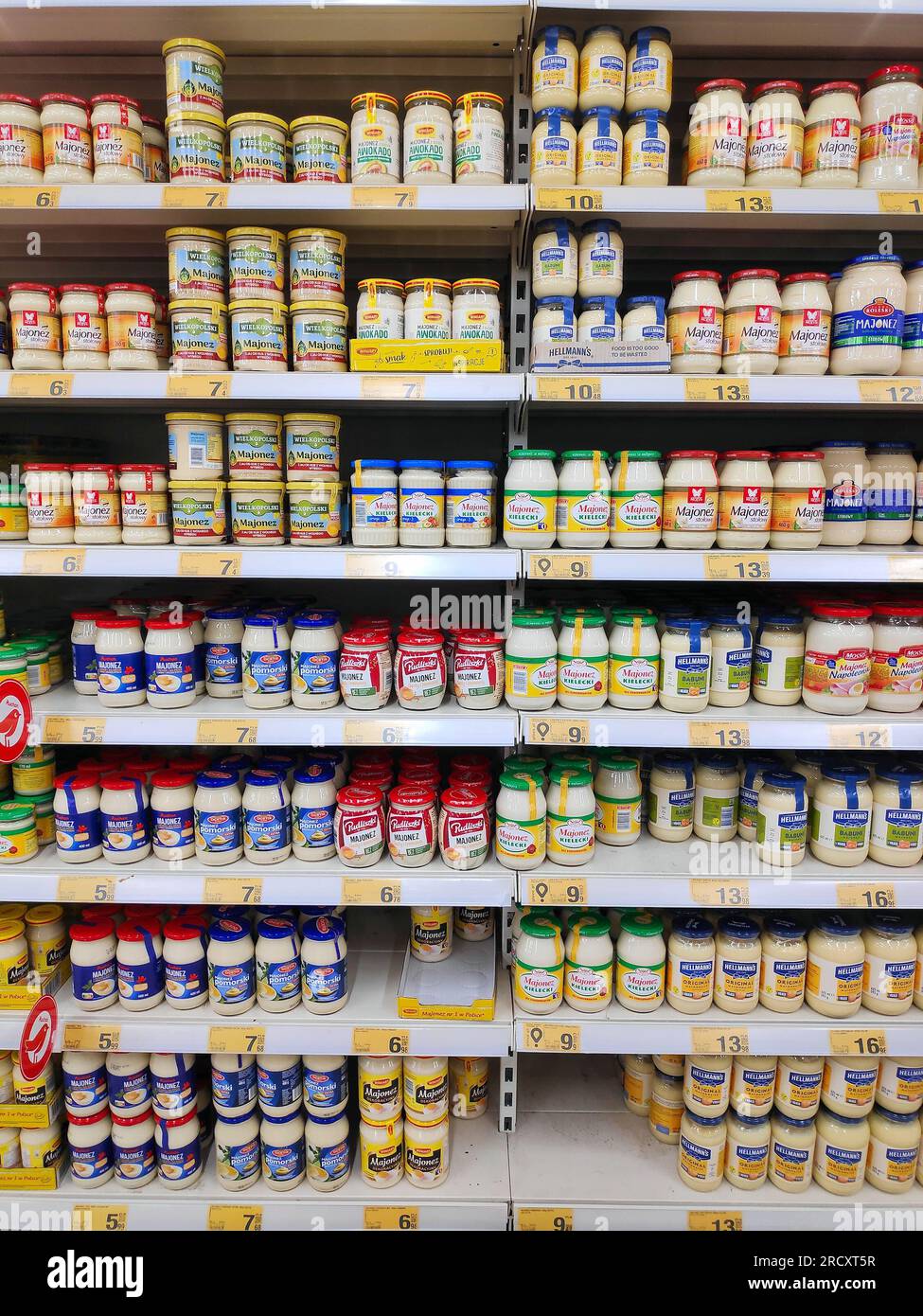 KATOWICE, POLAND - JANUARY 13, 2023: Various types and brands of mayonnaise in a supermarket in Katowice, Poland. Stock Photo