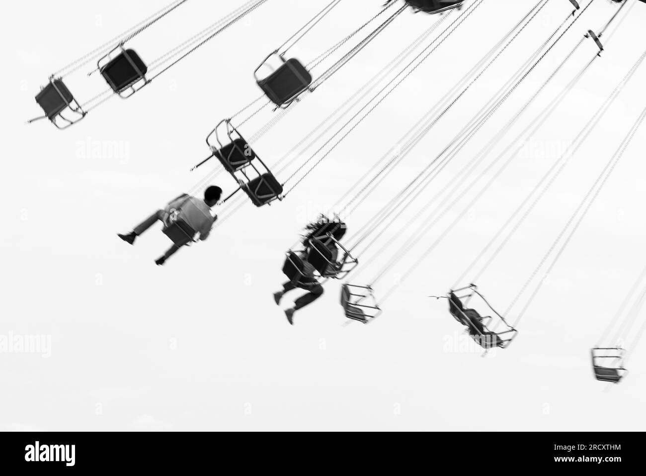 Group of people enjoying a ride on the chairlifts at the amusement park at Navy Pier in Chicago, Illinois, USA Stock Photo