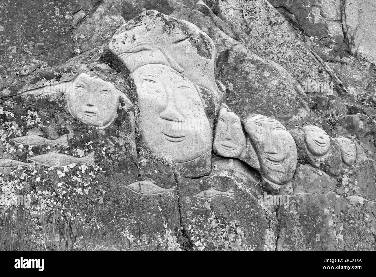 Faces, Rock art carvings, part of Stone & Man project by local artist