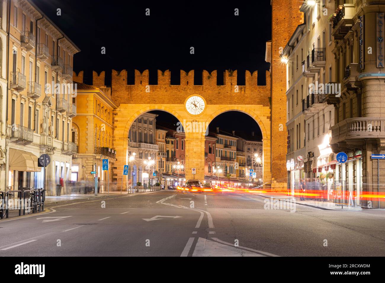 I Portoni della Brà city walls at night - Verona, Italy Stock Photo
