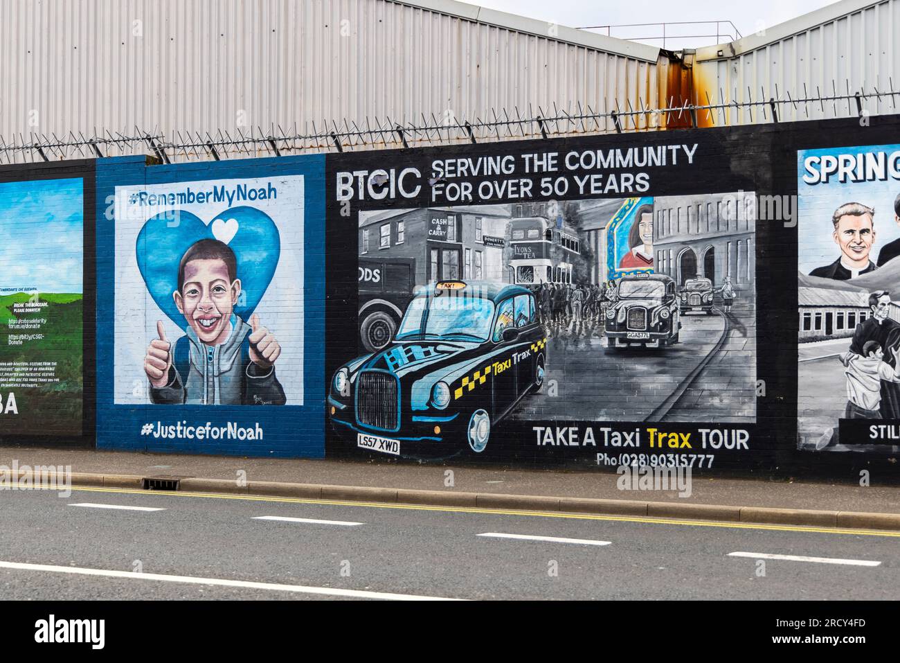 Peace Wall murals painted in West Belfast, the Troubles and Peace Process Landmarks, County Antrim, Northern Ireland, United Kingdom. Stock Photo