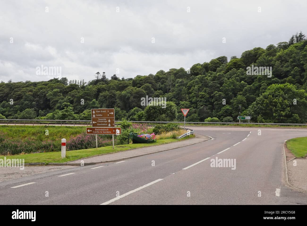 Whisky trail sign for Glen Grant, Cardhu and Glenfiddich distilleries at junction of A95 and A941 Craigellachie Moray Scotland  July 2023 Stock Photo