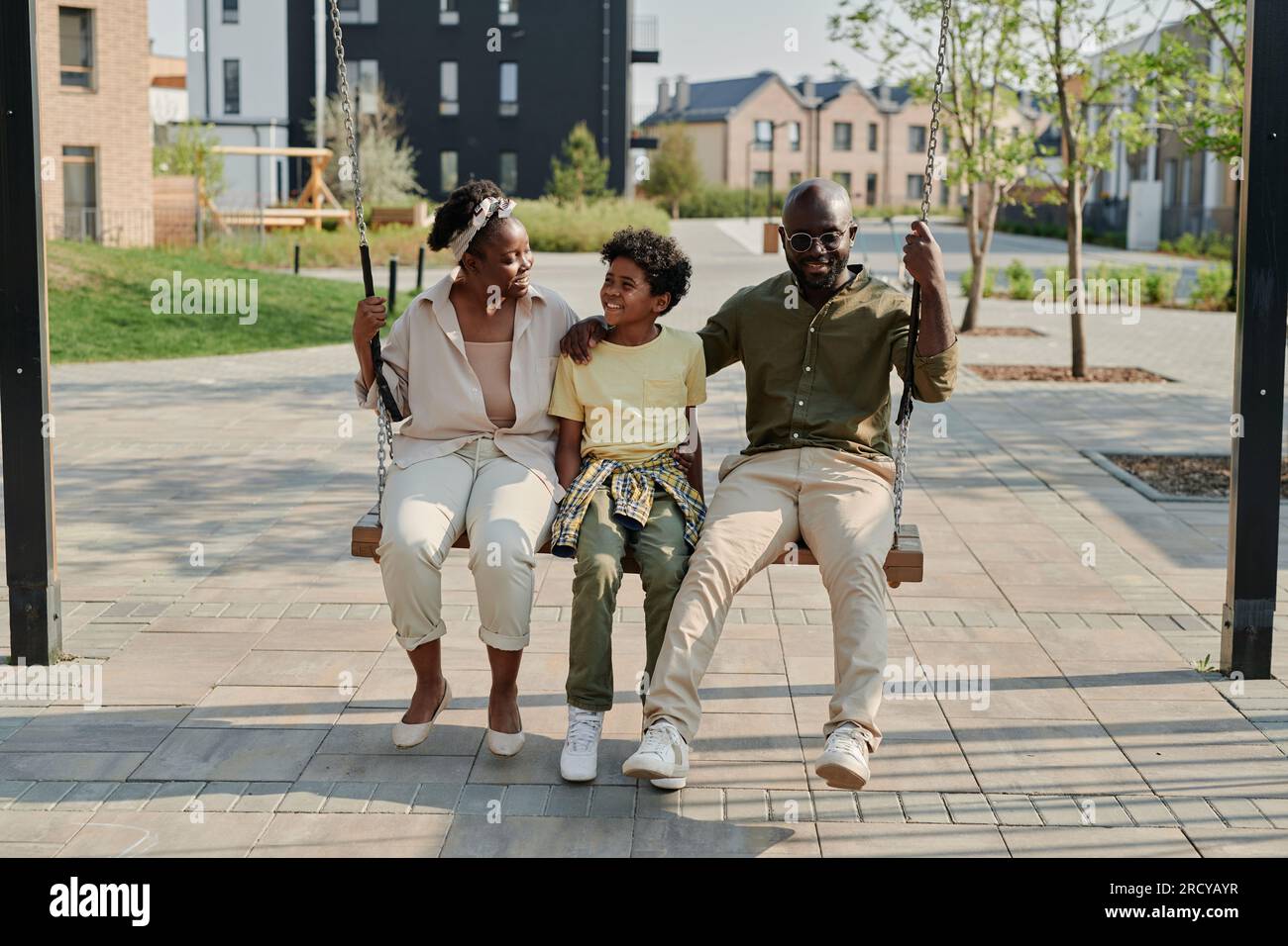 African american boy swinging on hi-res stock photography and images - Alamy