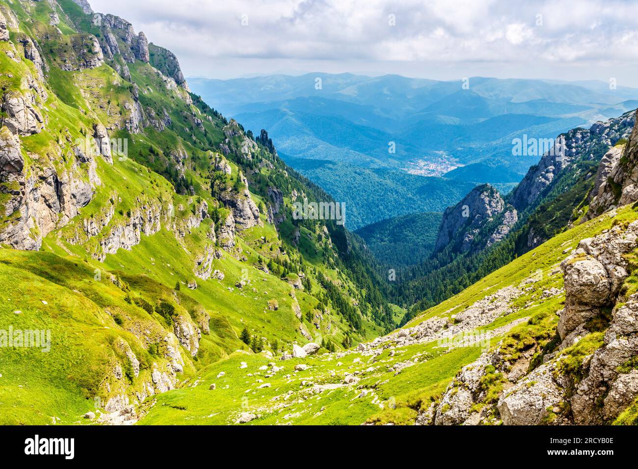 Mountaineering trail from Busteni to the Omu Peak through Râul Valea Priponului valley, Bucegi Mountains, Romania Stock Photo