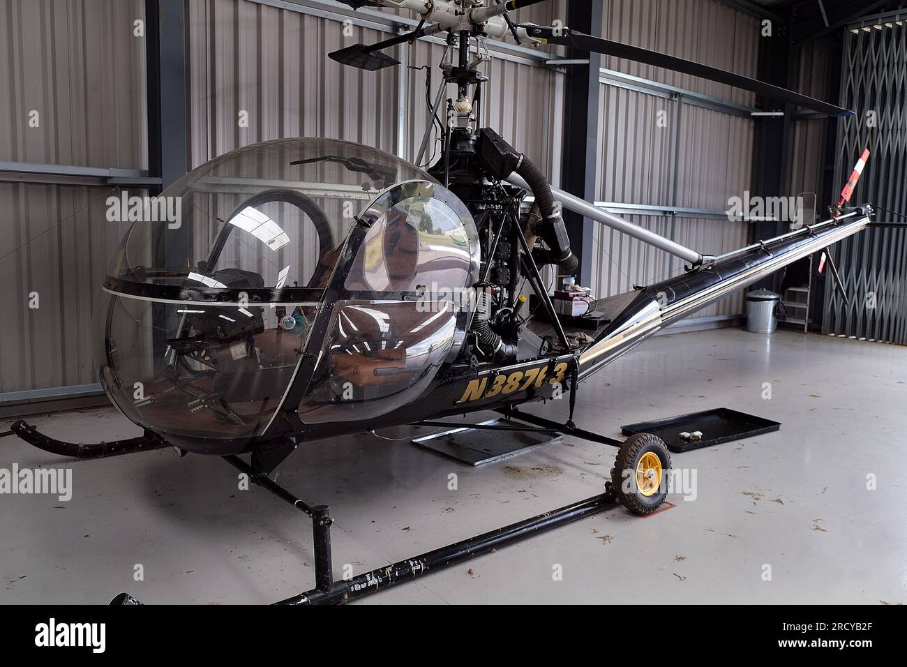 The Bell 47 is a single-rotor single-engine light helicopter manufactured by Bell Helicopter. Stock Photo