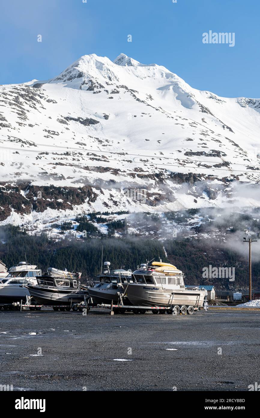 The main car and boat trailer parking area in Whittier with snow