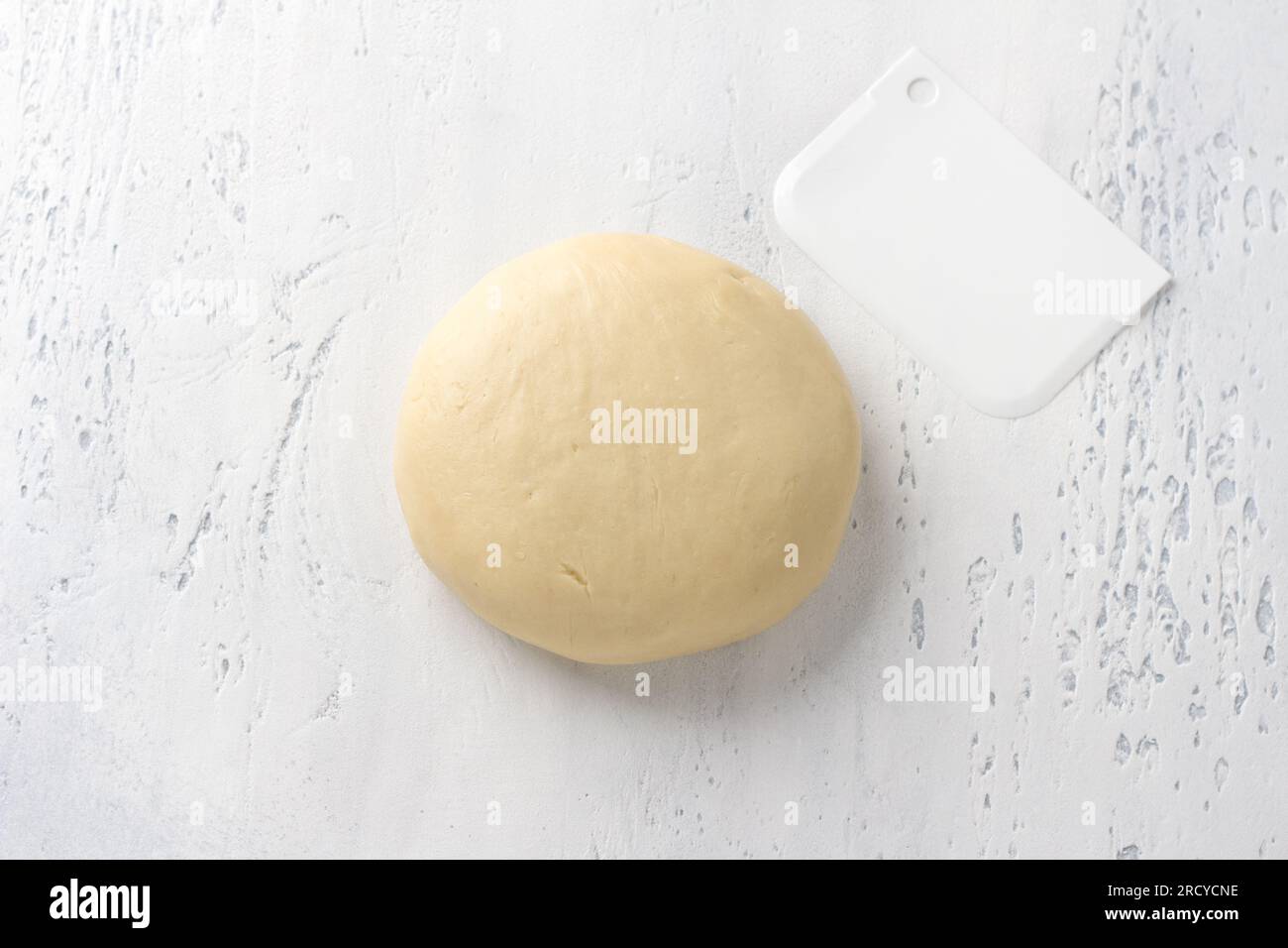 Ready-made dough for homemade milk shortcakes, do it yourself, step by step, step 7. Stock Photo