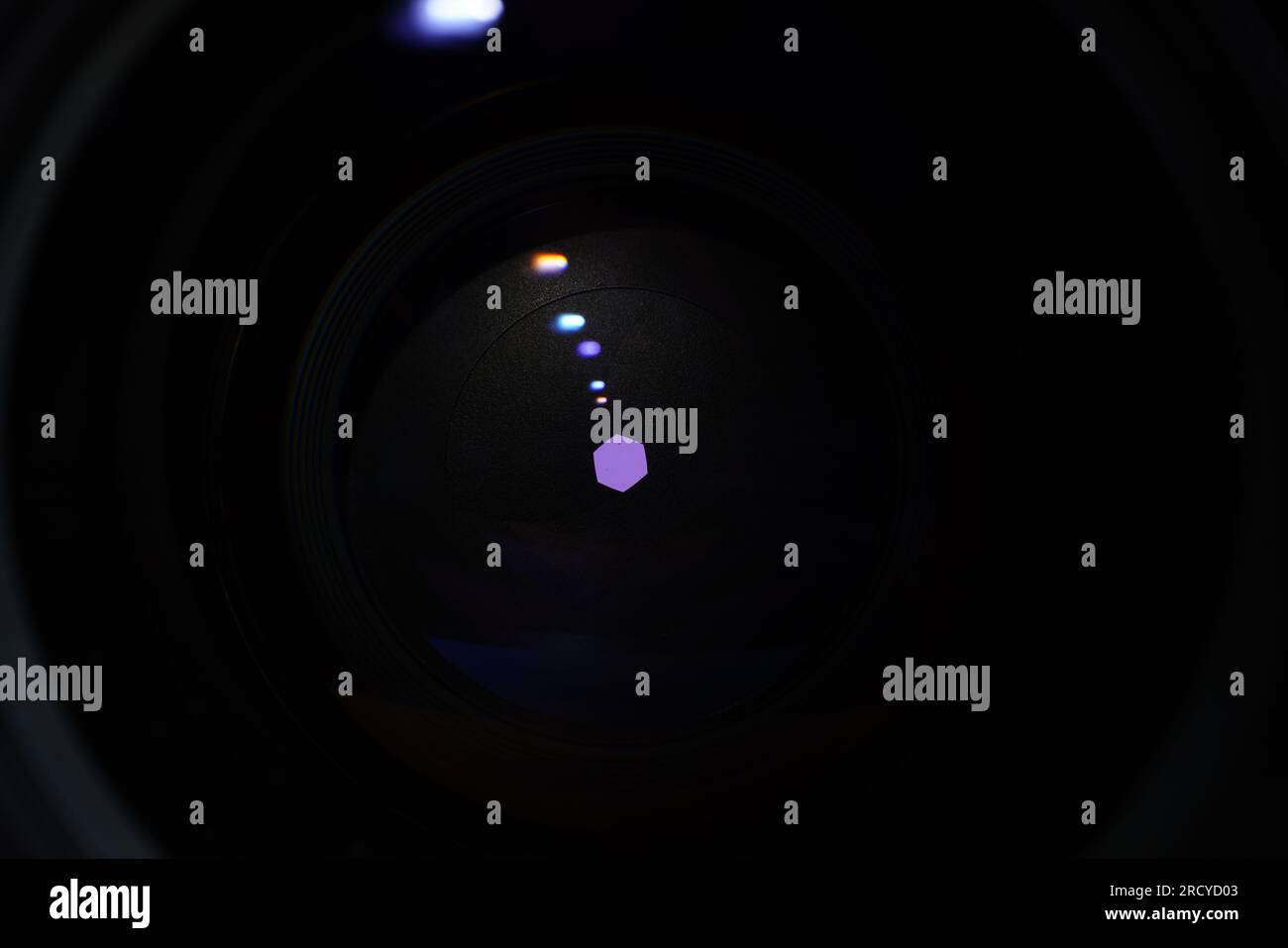 Camera lens with light and lens flare, closeup. Selective focus Stock Photo Alamy