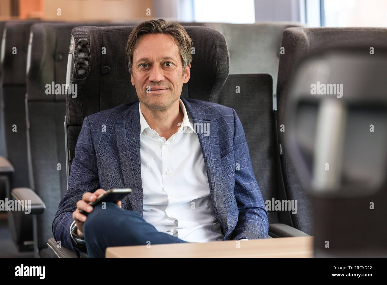 Krefeld, Germany. 17th July, 2023. Michael Peterson, member of the Siemens Mobility Managing Board, sits in an ICE 3 NEO. To modernize its long-distance fleet, Deutsche Bahn has ordered 90 ICE 3 Neo trains from train builder Siemens - the last of which is to be delivered by August 2028. (To dpa: 'Deutsche Bahn: Delivery of all ICE 3 Neo by August 2028') Credit: Oliver Berg/dpa/Alamy Live News Stock Photo