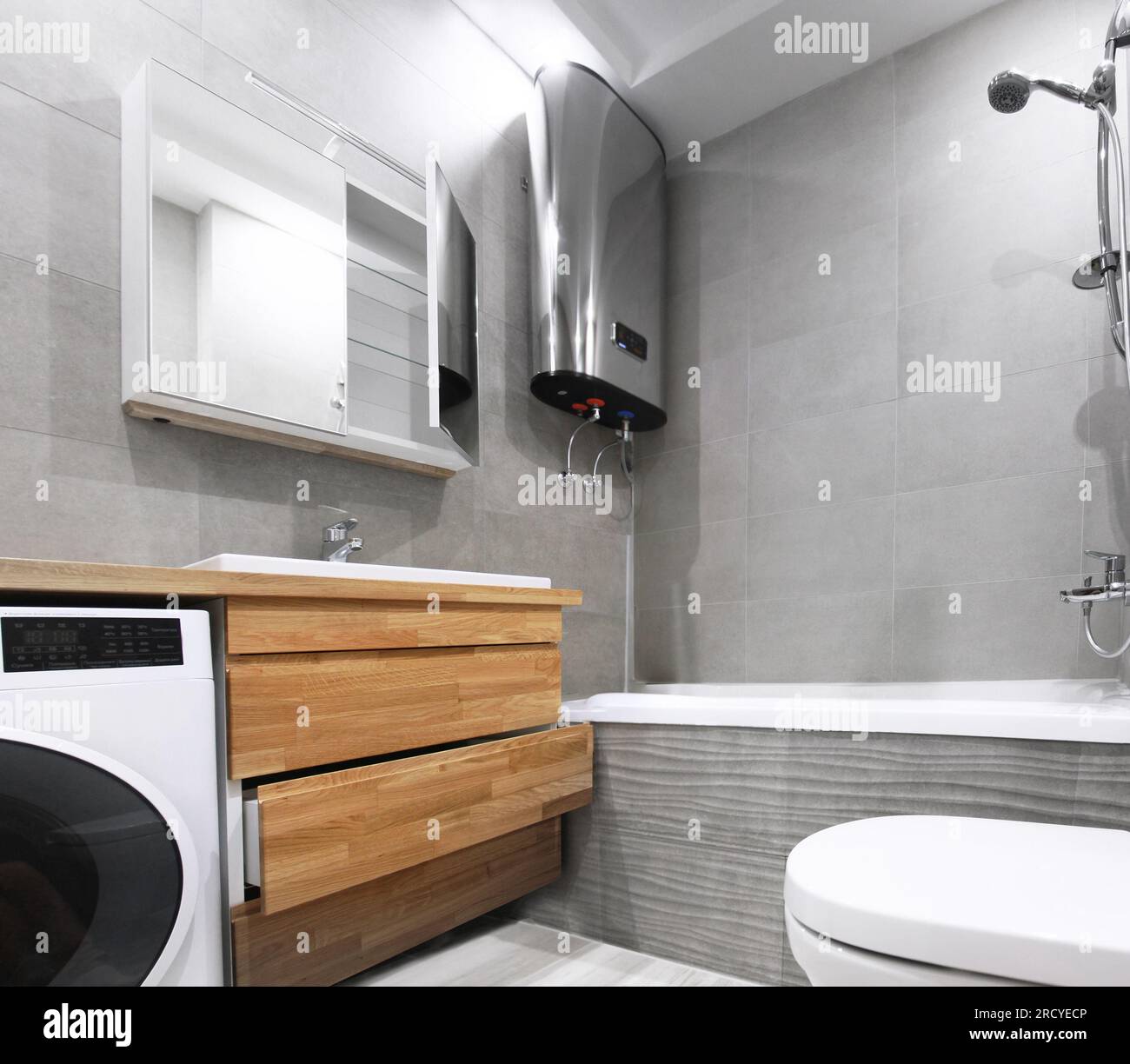minimalist style bathroom interior with wooden oak furniture, boller, Scandinavian motifs, Stock Photo