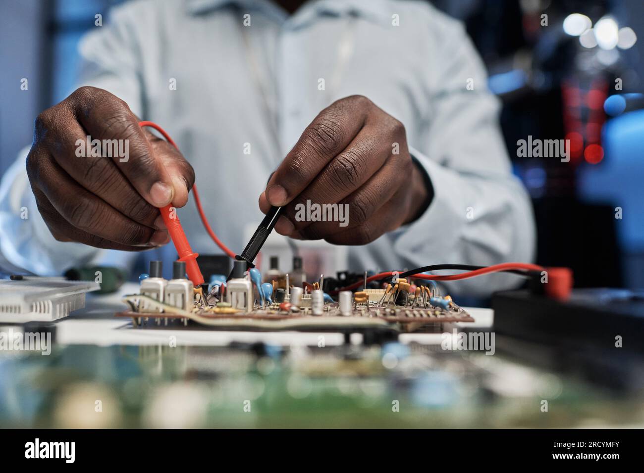 African american engineer soldering pcb hi-res stock photography and ...
