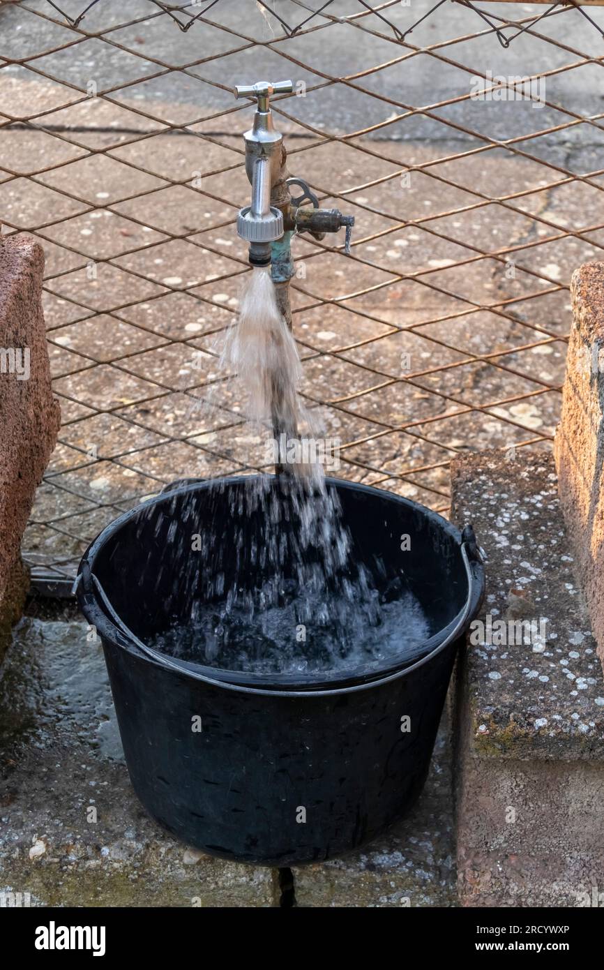 Outdoor faucet in the yard Stock Photo Alamy