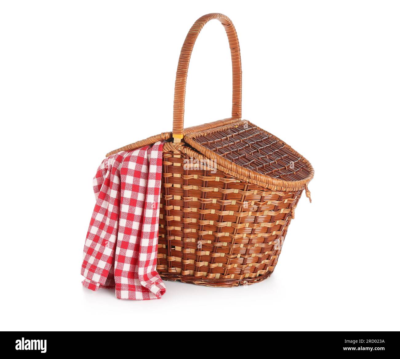 Wicker picnic basket with red checkered napkin on white background ...