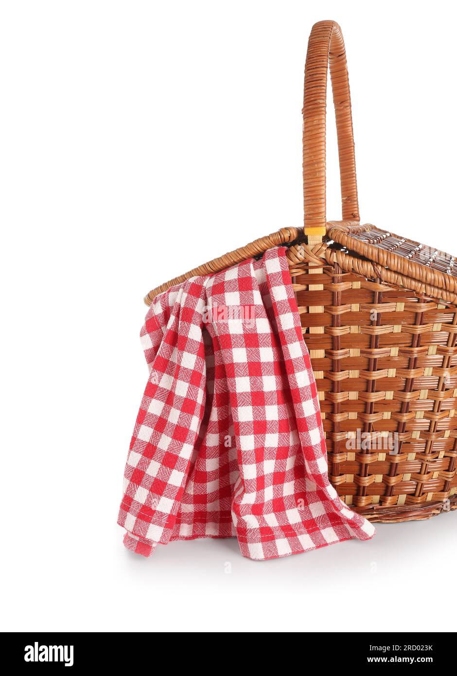Wicker picnic basket with red checkered napkin on white background ...