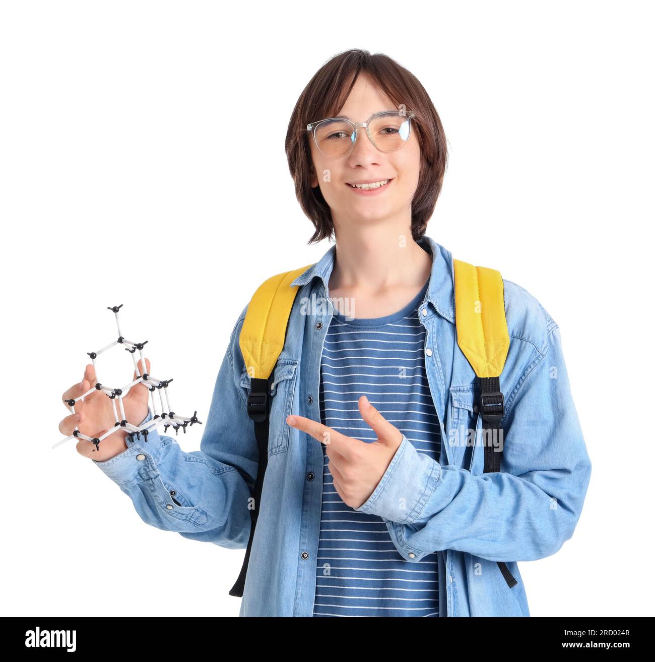 Male student pointing at molecular model on white background Stock Photo