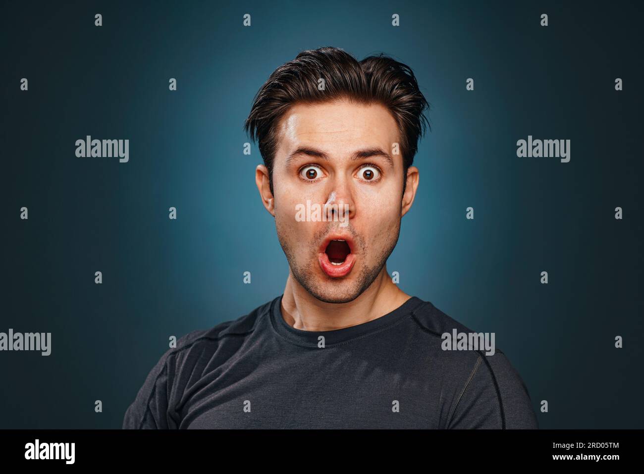Young man emotional wow portrait Stock Photo