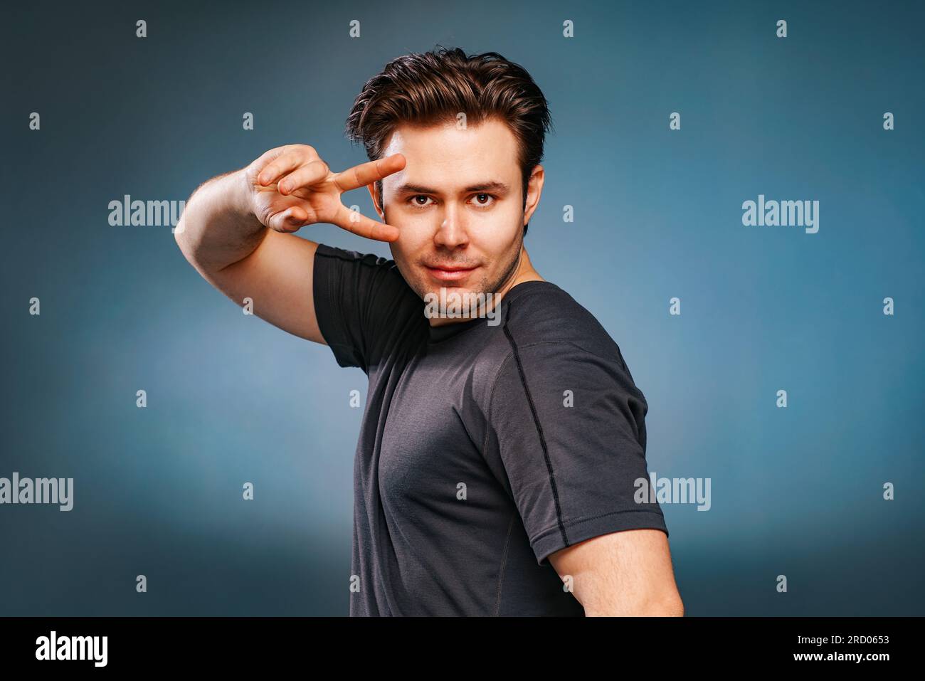 Young brunette handsome man posing Stock Photo