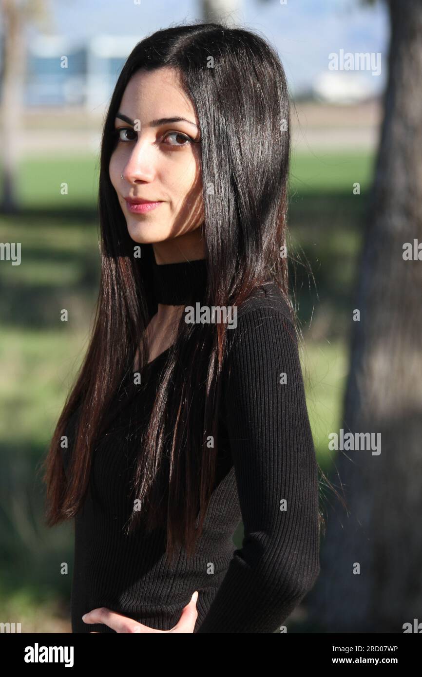 Middle Eastern girl in a park Stock Photo - Alamy