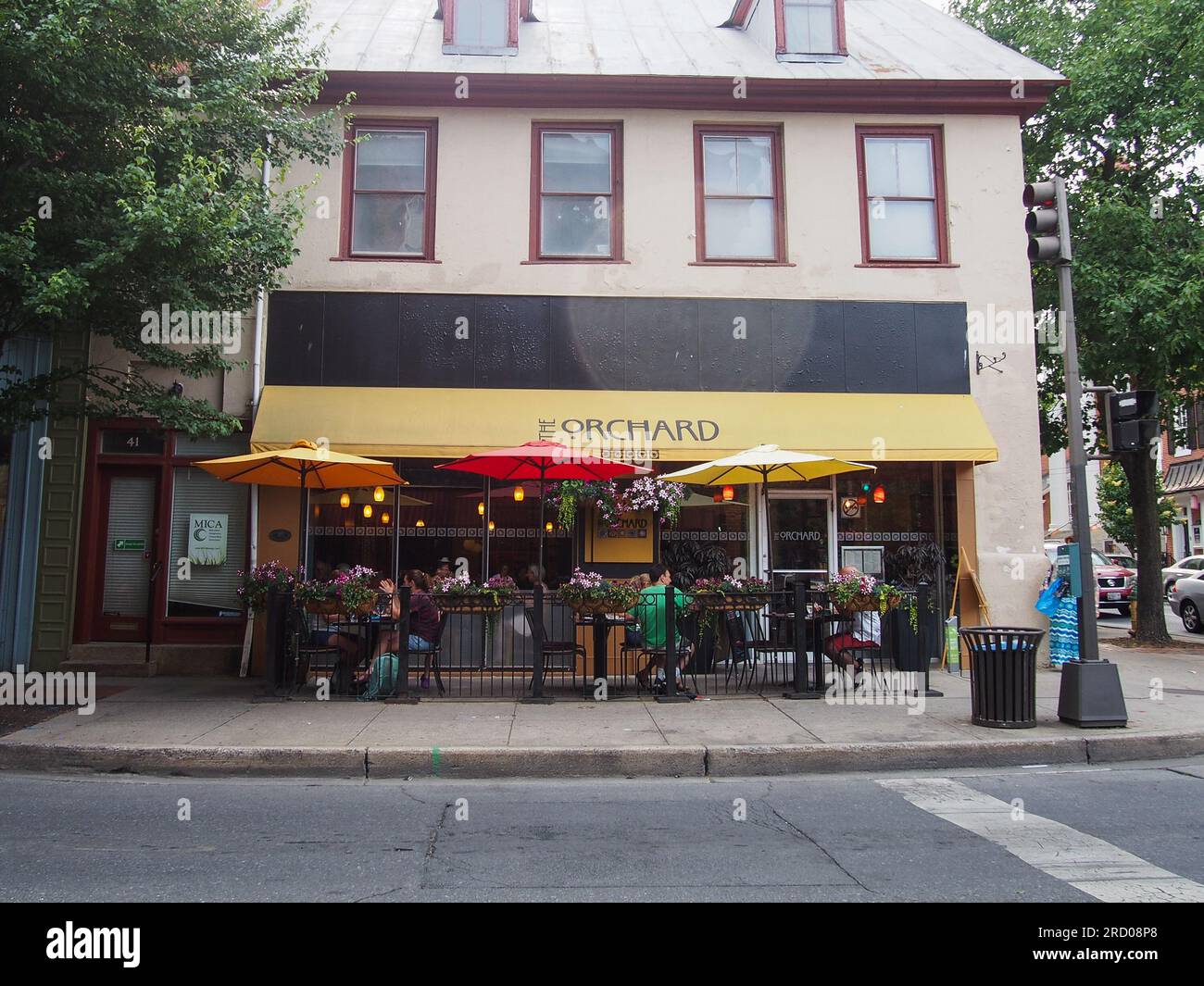 Patrons dining al fresco at The Orchard restaurant in Frederick