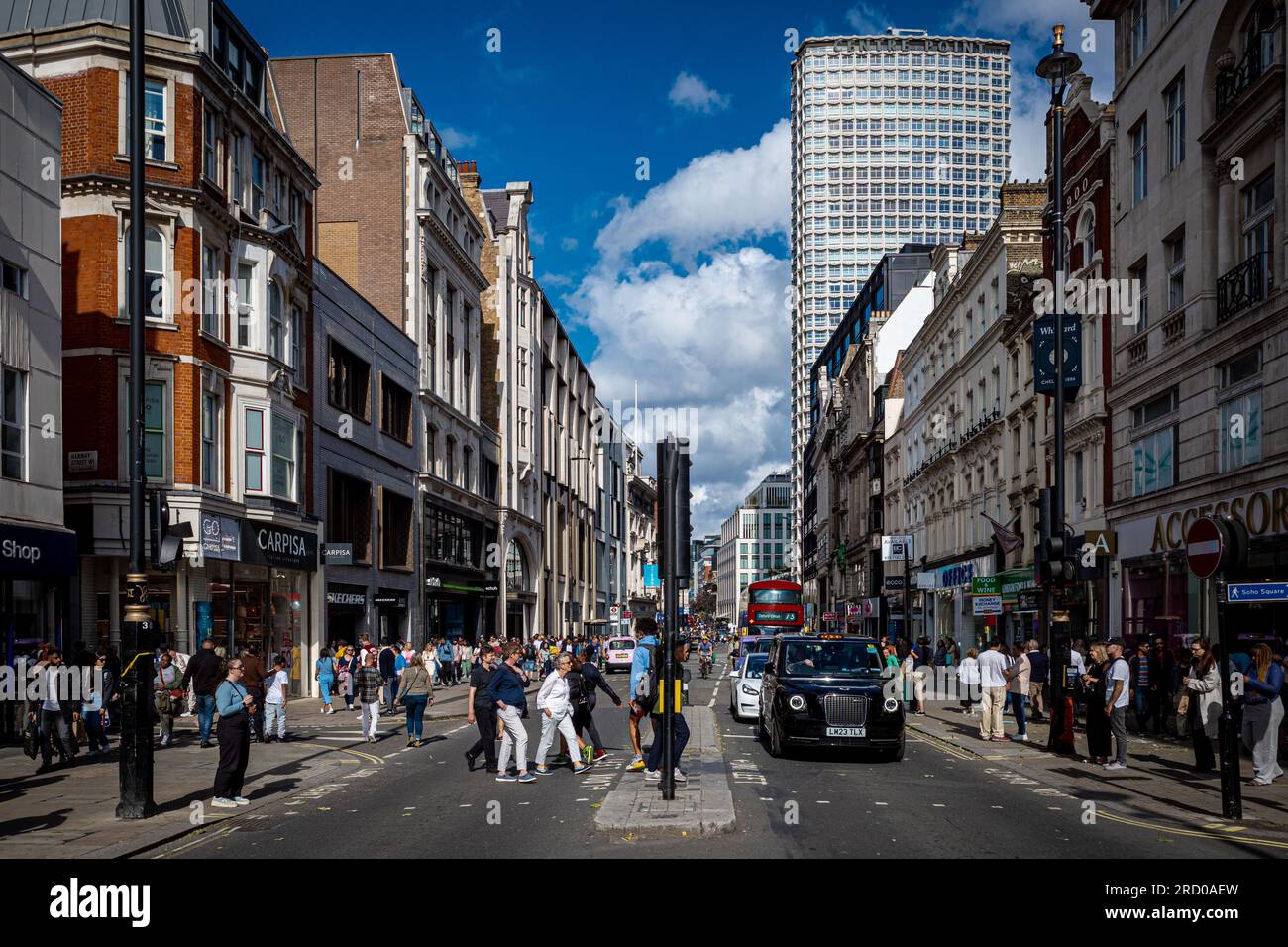 Oxford Street London, Oxford St London. View east down Oxford St towards Tottenham Court Rd and Centre Point. Europe's busiest shopping street. Stock Photo