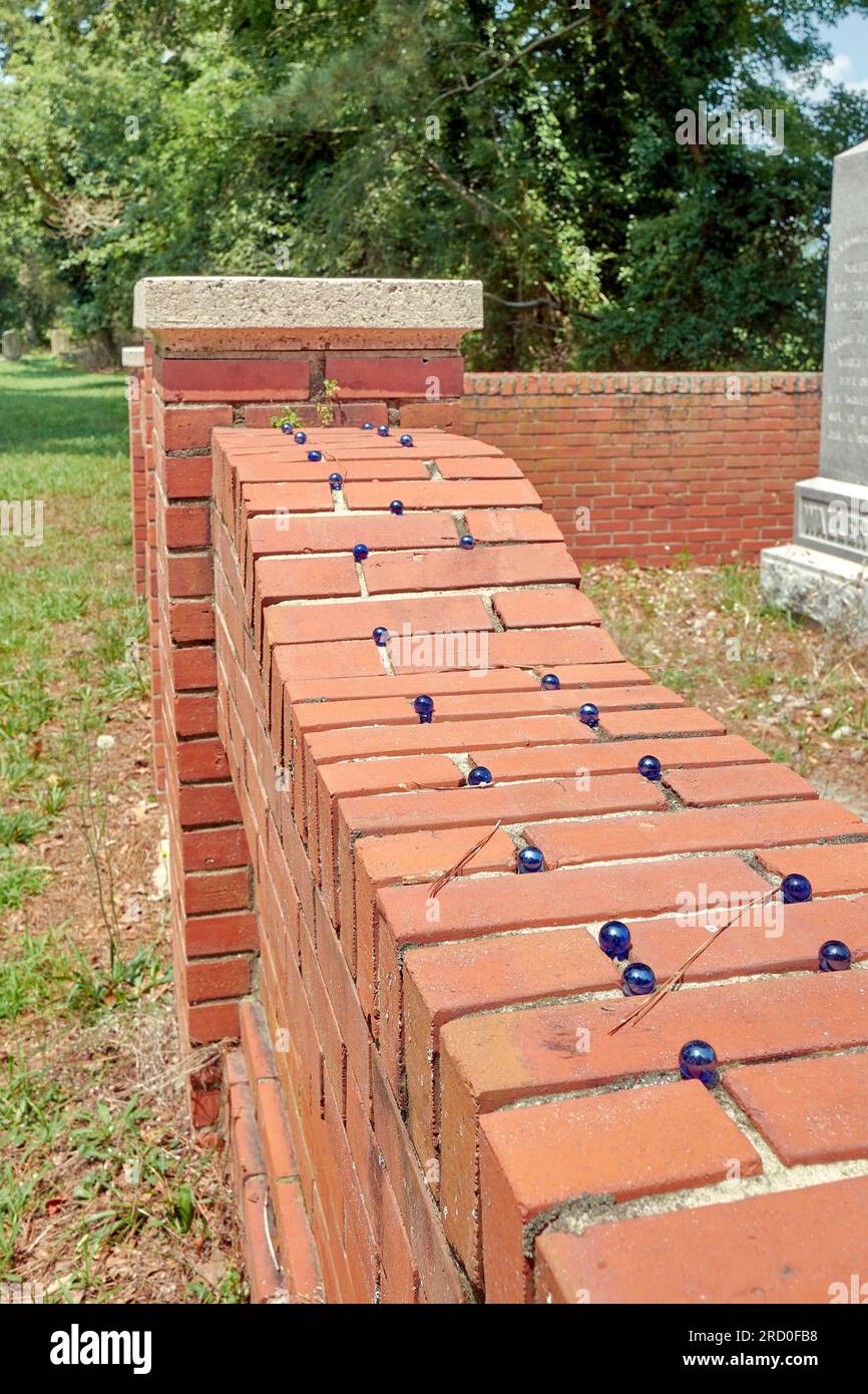 Grave wall with blue marbles.  Originally known as Old Green Hill Church, St. Bartholomew's Episcopal Church  is located near Quantico, Maryland USA. Stock Photo